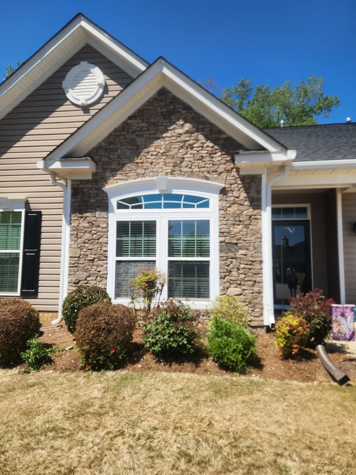 This Simpsonville home went from vinyl siding to hand-stacked Tennessee fieldstone — a total transformation.
